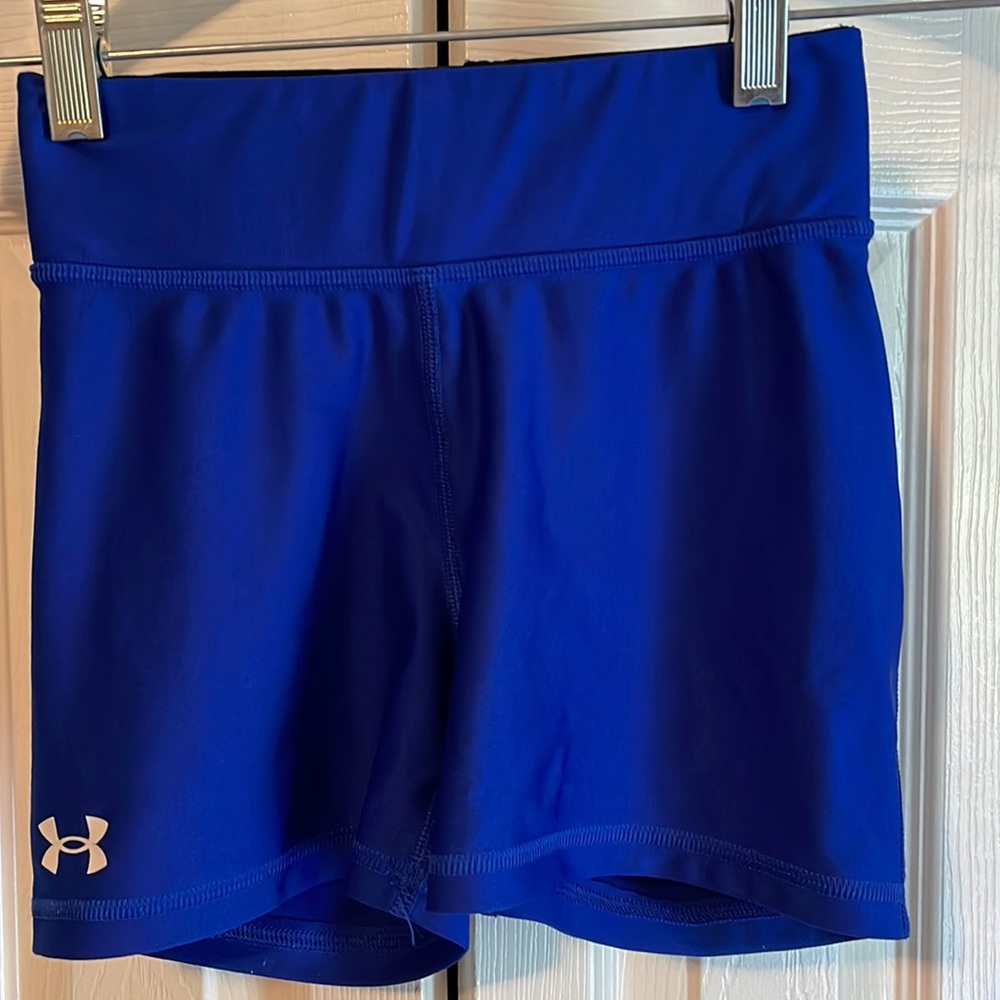 UA women’s athletic shorts; small separation in waist seam shown in photo